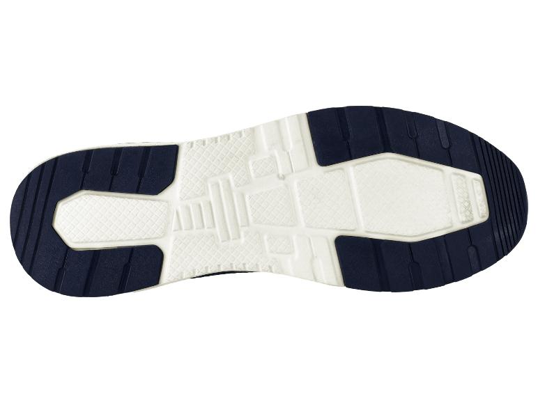 Zool van een sportschoen met een wit en donkerblauw patroon