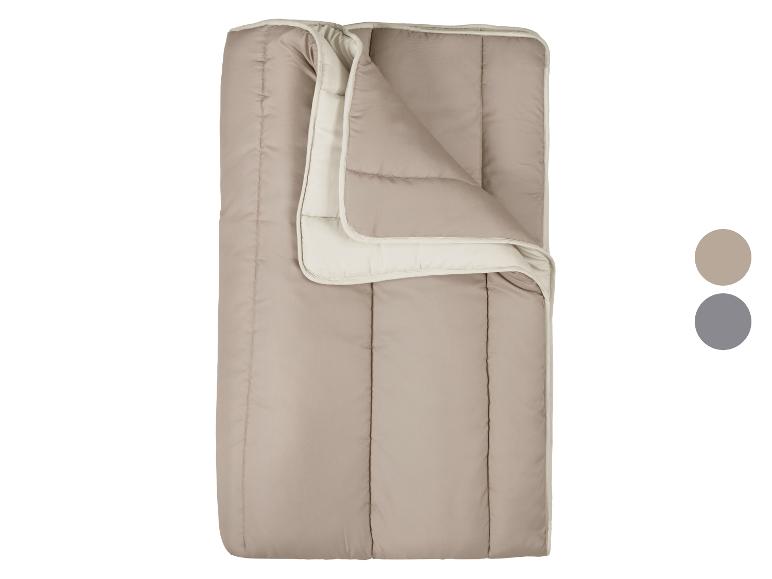 Omkeerbaar dekbed in beige en crème, met stiksels