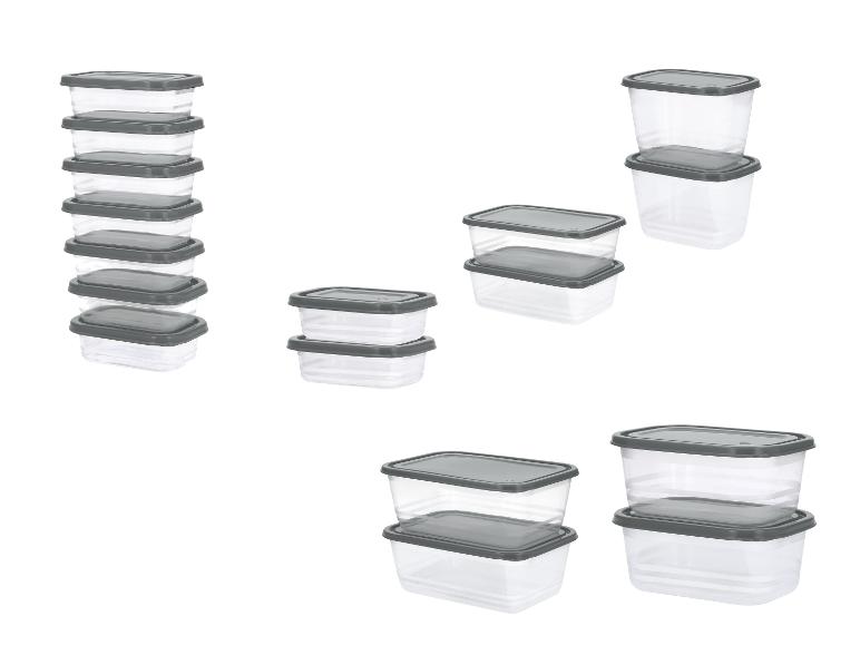 Set transparante plastic voedselcontainers met grijze deksels, gestapeld in diverse configuraties.