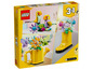 LEGO Creator 3-in-1 set met een gieter, een bloem in een laars en een vogel.