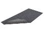 Donkergrijze badmat of loper met opstaande rand die de antislip onderkant toont.