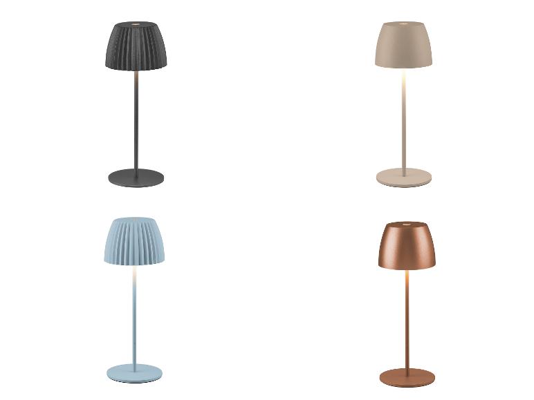 Vier draagbare, oplaadbare tafellampen in verschillende kleuren: donkergrijs, beige, lichtblauw en koper.