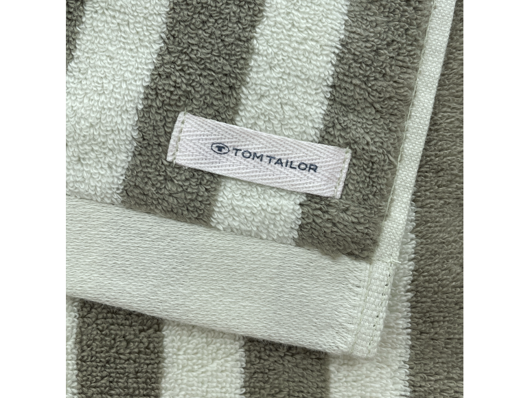 Handdoek met grijze en witte strepen en een wit etiket