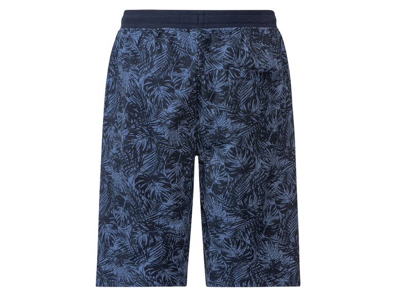 Blauwe korte broek met tropisch bladmotief.