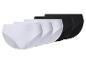 Verpakking met vier slips, twee witte en twee zwarte.