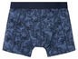 Blauwe boxershorts met een tropisch bladerenpatroon.