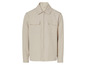 Beige overhemd met lange mouwen en rits.