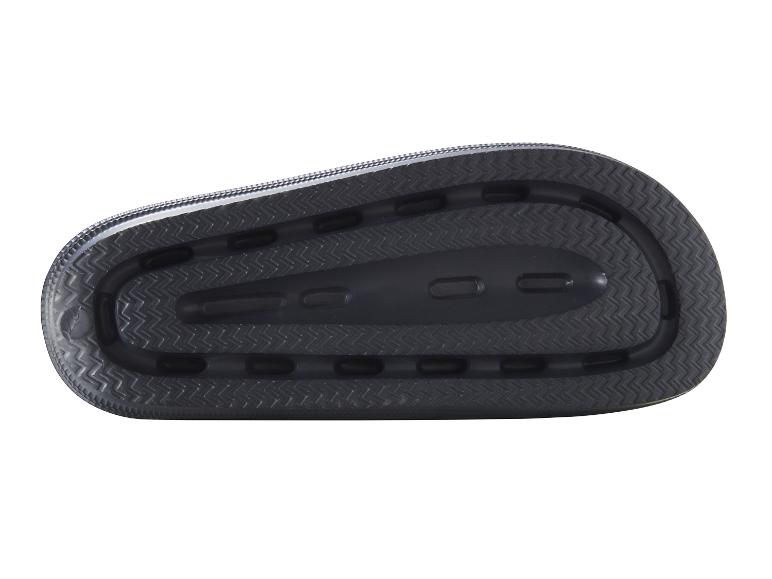 Zool van slippers of sandalen met zigzagpatroon.