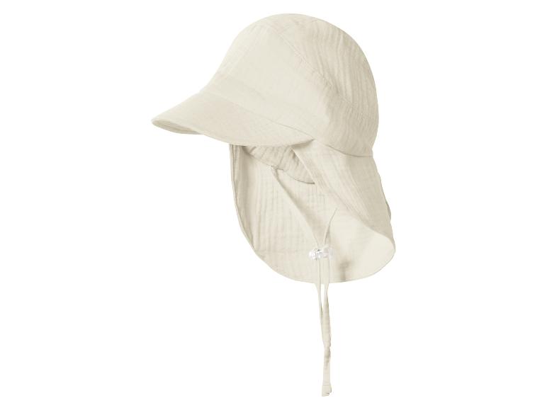 Lichtbeige zonnehoed met nekflap en kinbandjes, gemaakt van gekreukelde stof.