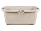 Beige wasmand met handvatten.