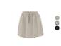 Beige rok met elastische taille en trekkoord, verkrijgbaar in drie kleuren.
