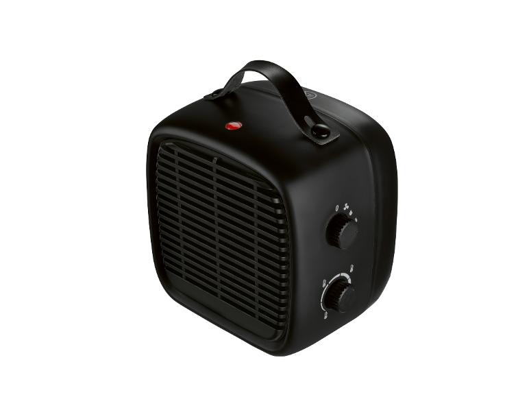 Zwarte draagbare elektrische kachel met handvat en bedieningselementen.