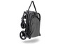 Een gevouwen Babyzen Yoyo2 kinderwagen met een schouderriem