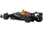 Zwart-gele Formule 1-speelgoedauto met racebanden.