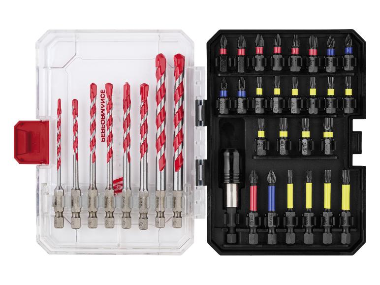 Set boorbits en schroevendraaierbits in een transparante en zwarte doos.