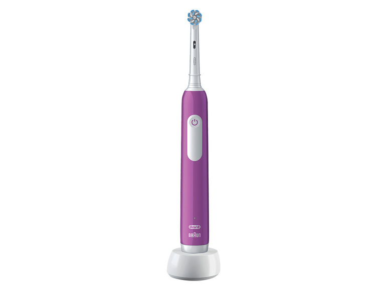 Een roze elektrische tandenborstel van Oral-B Braun met een oplader.