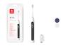 Oclean X Lite elektrische tandenborstel met slimme functies en oplaadkabel.