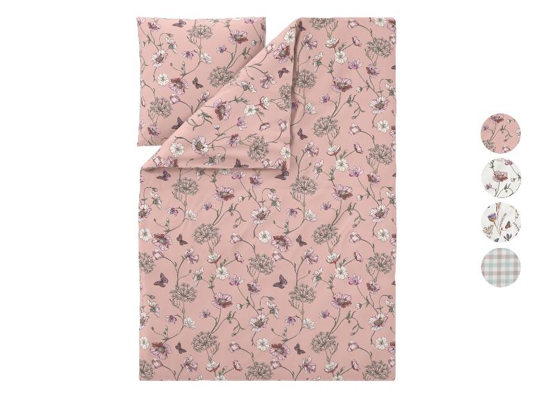Dekbedovertrekset met bloemen- en vlinderpatroon in roze tinten, met bijpassende kussensloop.