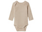 Beige baby romper met lange mouwen