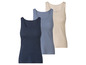 Drie basic tanktops in donkerblauw, lichtblauw en beige.