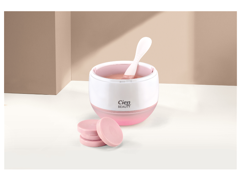 Cien Beauty wax warmer met wax schijfjes.