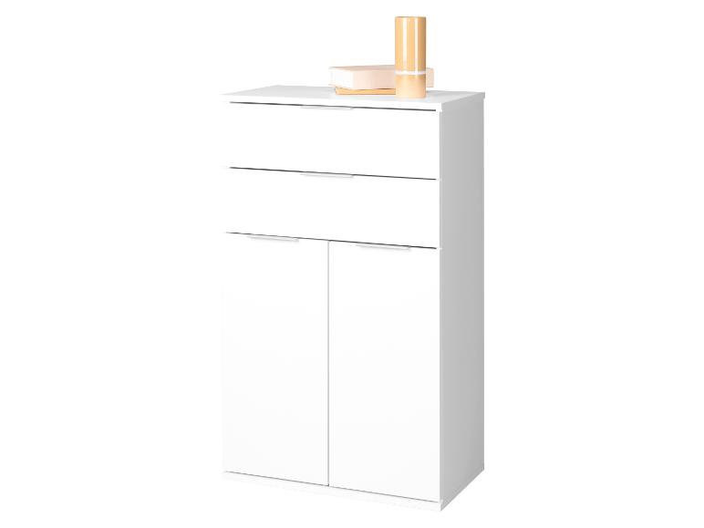 Witte kast met twee lades en twee deuren, versierd met boeken en een vaas.