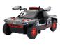 Een zwart en rood Audi e-tron off-road model.