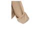 Close-up van een mouw van een beige wollen jas met geribbelde manchet.