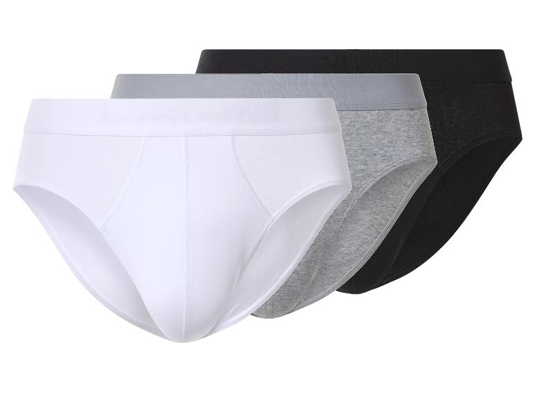 Drie herenslips in wit, grijs en zwart.