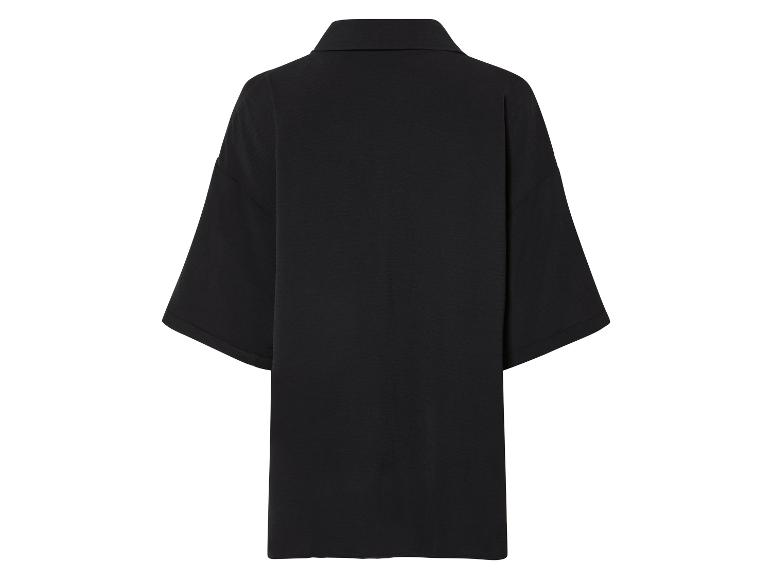 Zwarte jurk met korte mouwen, achterkant.