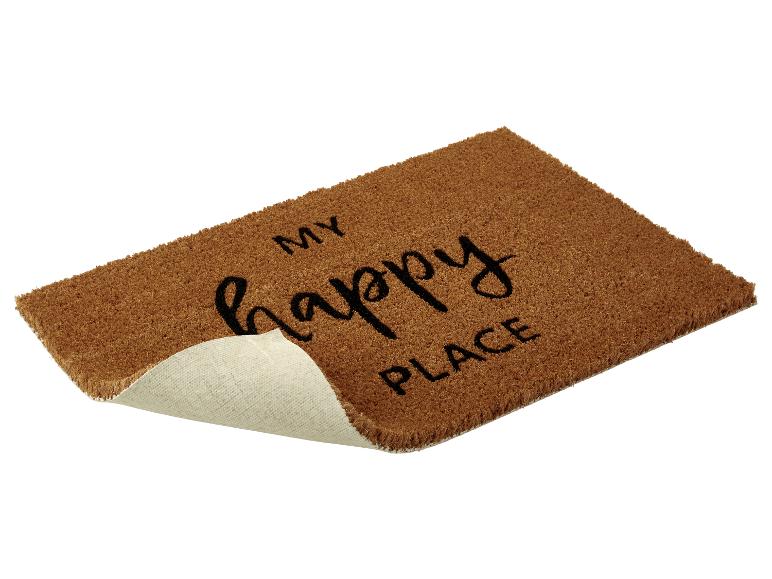 Een bruine deurmat met de tekst 'My happy place'.