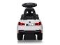 Witte plastic BMW loopwagen voor kinderen met stuur.