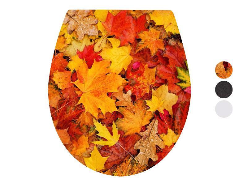 Toiletbril met herfstbladeren print.