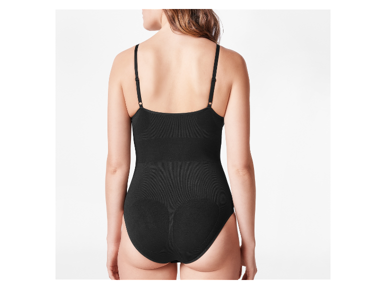 Een zwart naadloos body, van achteren gezien.