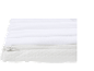 Witte matrashoes met rits en gewatteerd oppervlak.