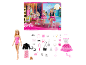 Adventskalender met pop en modeaccessoires, inclusief kleding en schoenen.