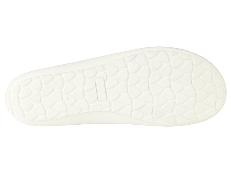 Witte schoenzool met textuurpatroon.