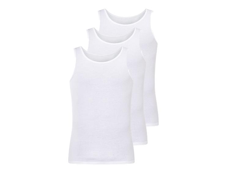 Drie witte tanktops.