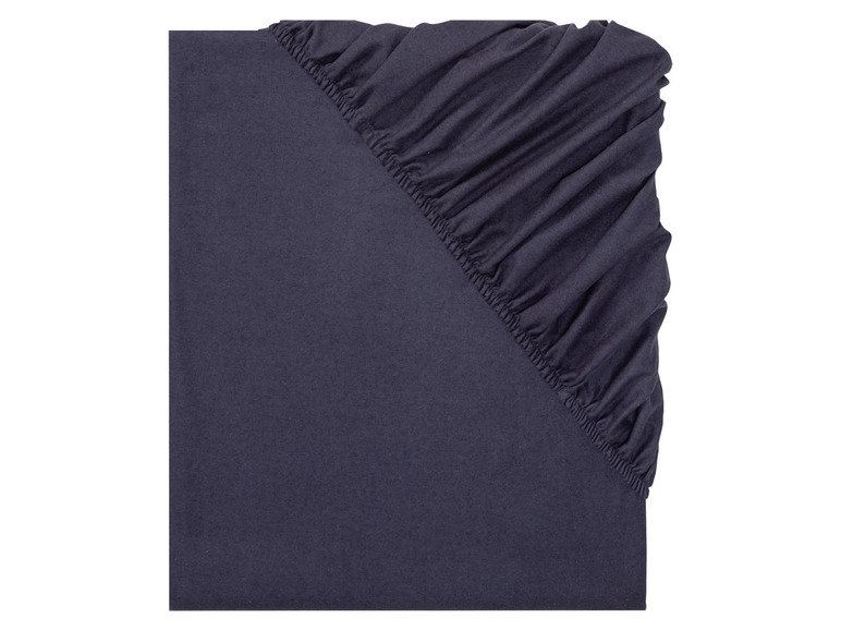 Een donkerblauwe hoeslaken met elastiek.