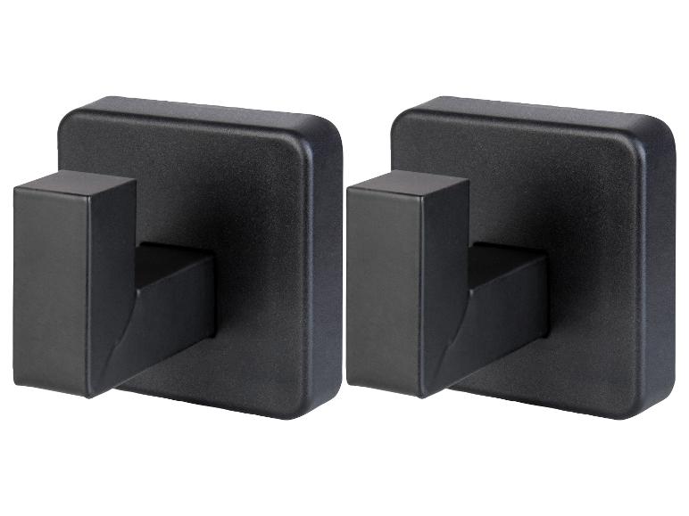 Twee vierkante zwarte haken.