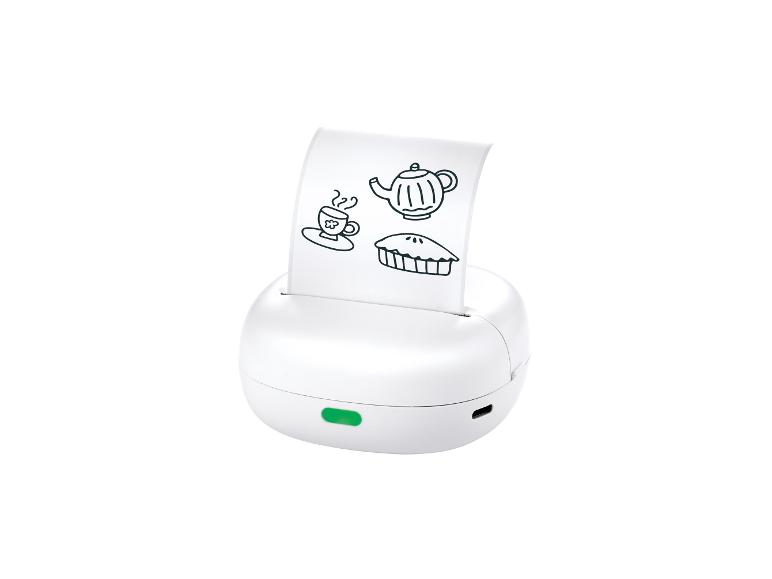 Witte draagbare thermische printer met afgedrukte afbeeldingen van theepot, kopje en taart.