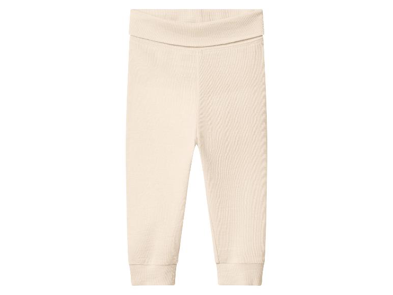 Lichtbeige babybroek met geribbelde textuur en brede tailleband