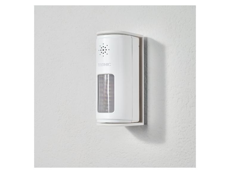 Witte TRONIC bewegingssensor op een witte muur.