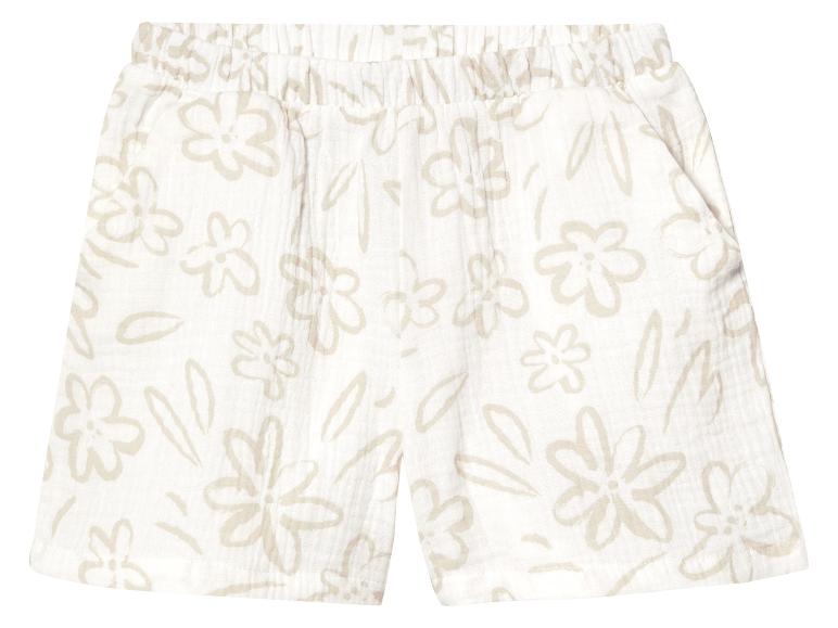 Kinder shorts met lichtbeige bloemenprint.