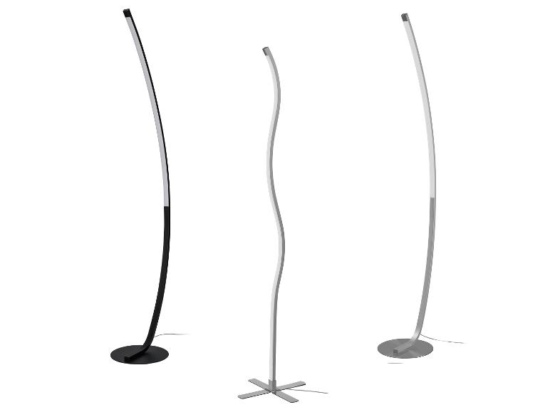 Drie moderne staande lampen in verschillende kleuren.