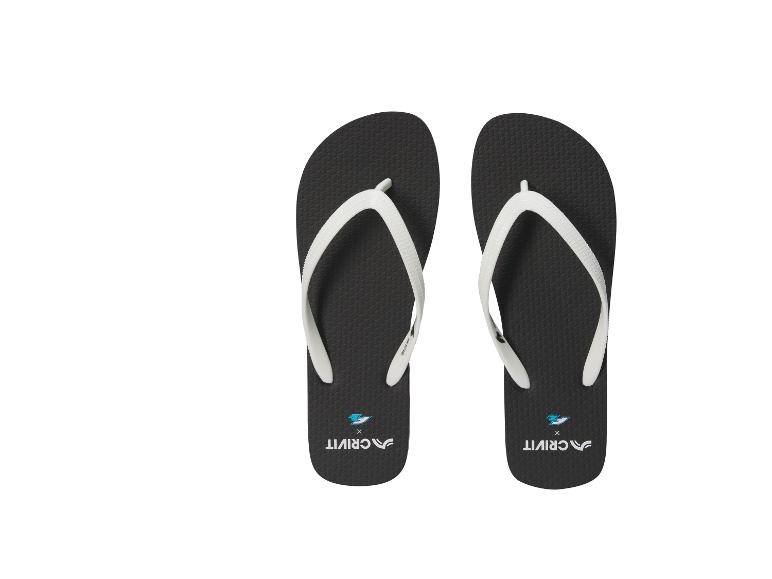Zwarte teenslippers met witte bandjes, bovenaanzicht.
