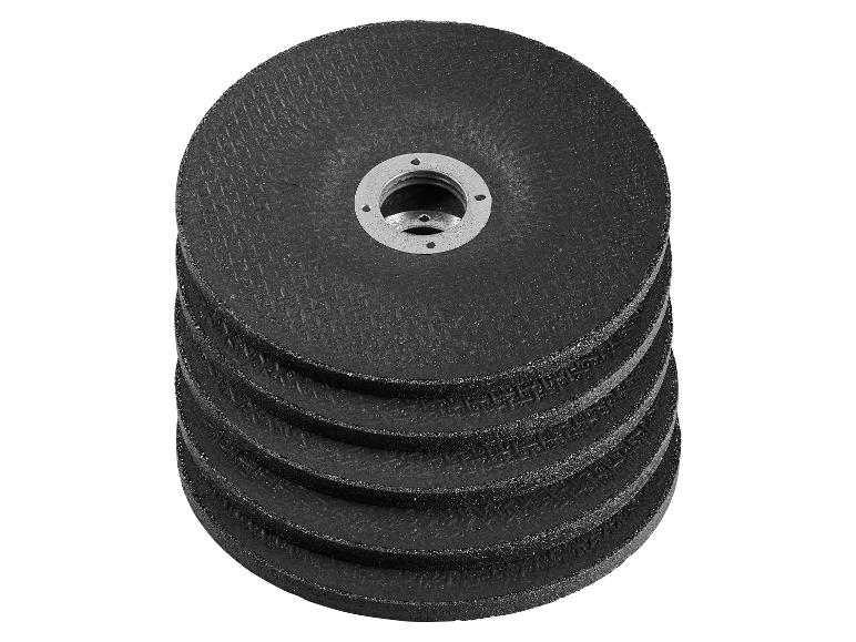 Gestapelde zwarte slijpschijven met een metalen midden.