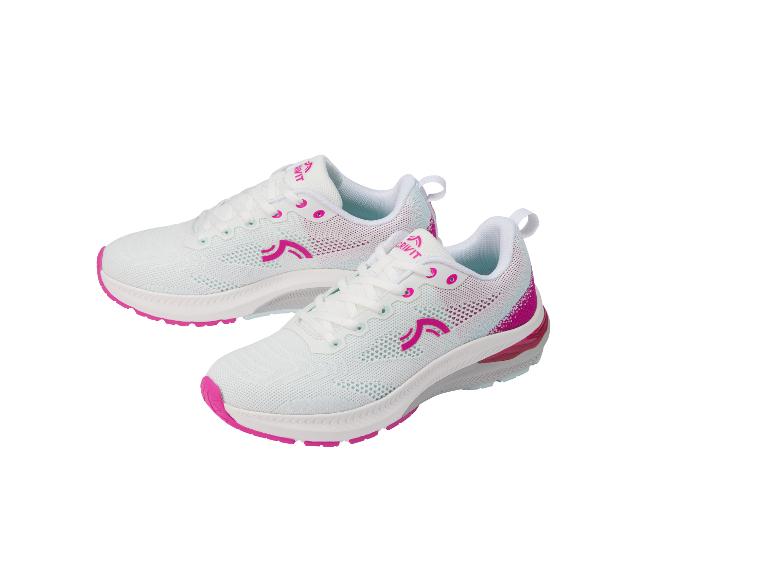 Witte Crivit sportschoenen met roze accenten.