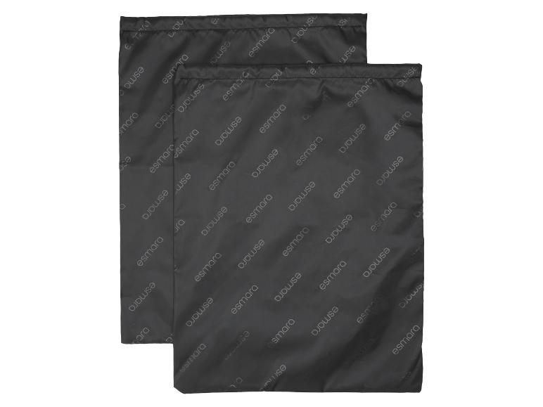 Twee zwarte Esmara waszakken met herhaald logo.