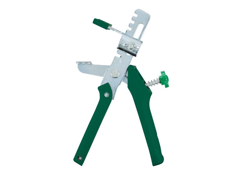 Tegelklem met groene handgrepen.